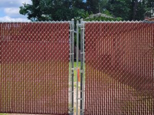 Photo of chain link fence with privacy slats in Slidell, Louisian