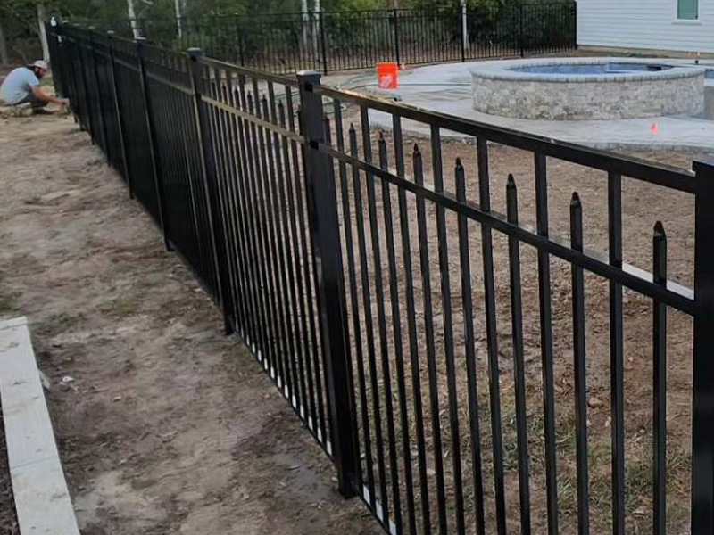 Residential flat top aluminum pool fence with extended pickets  installation in Slidell, Louisiana